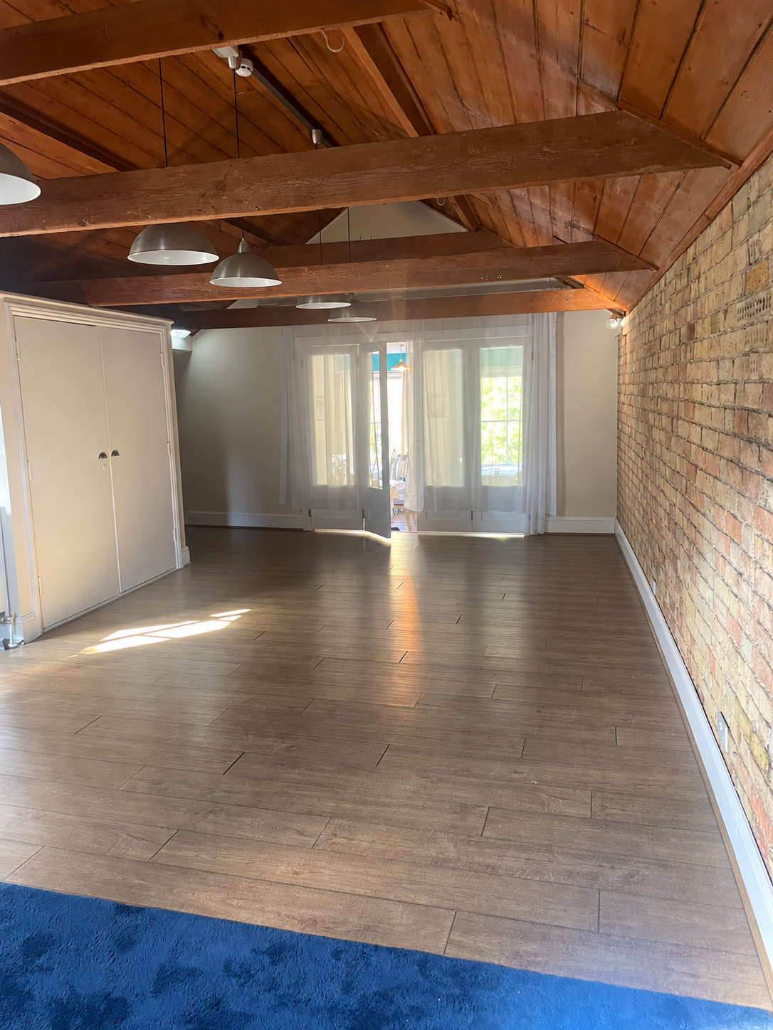 The real private room at Soleá Bistro, cleared of stored furniture